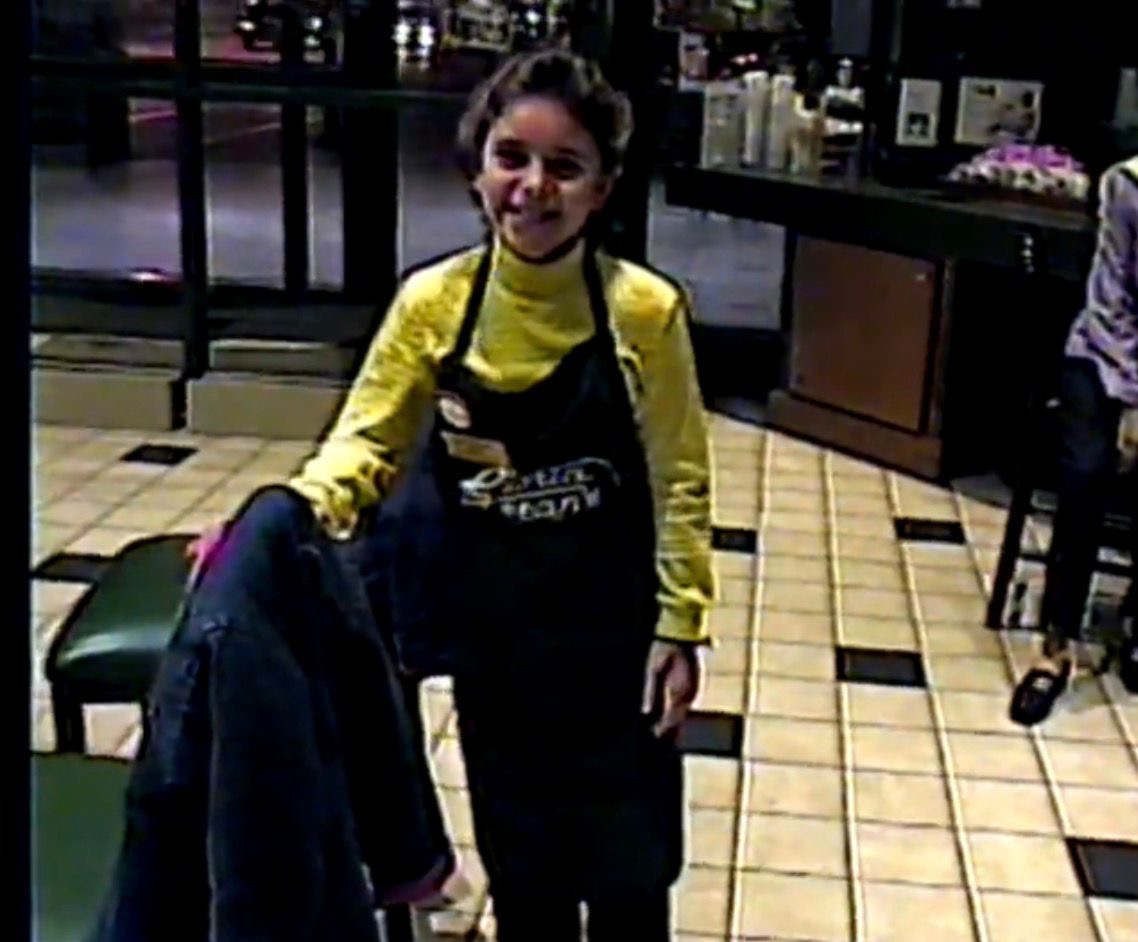 Muaz’s older sister behind the counter at Gloria Jean’s