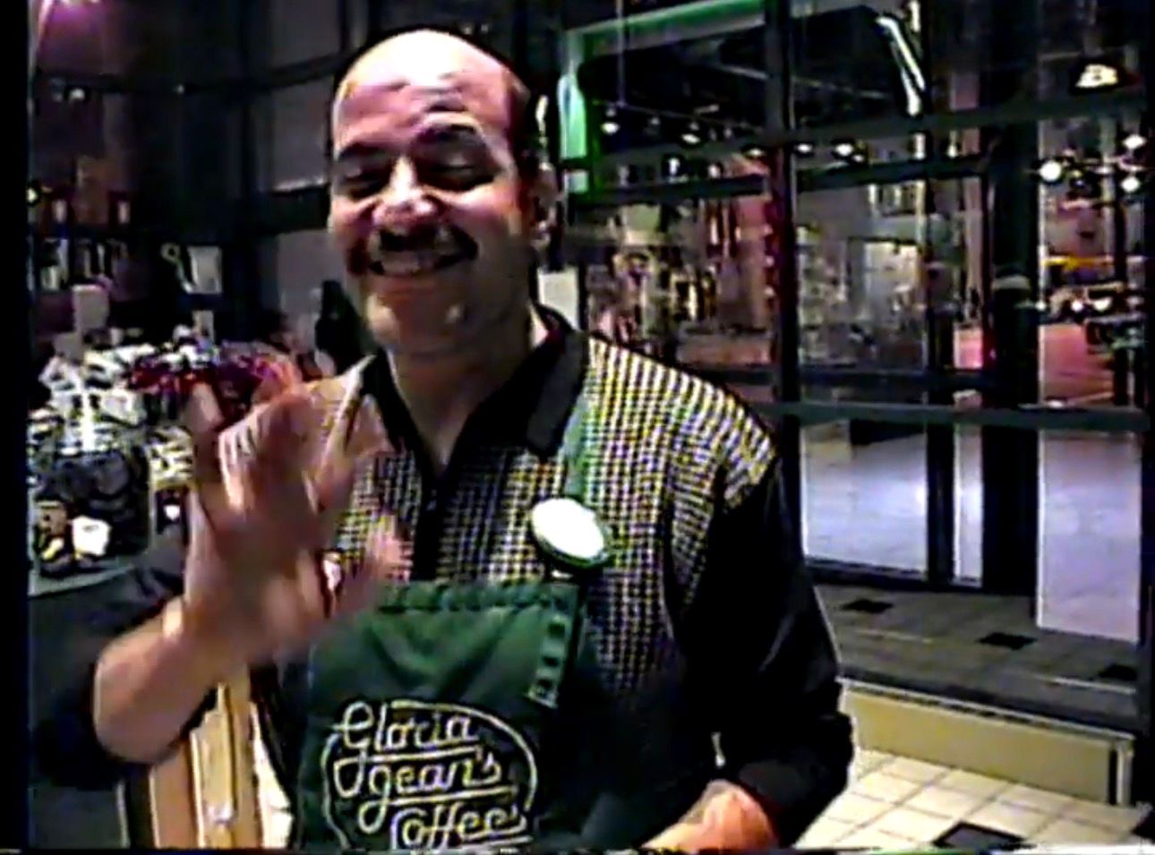 Muaz’s father wearing his Gloria Jean’s apron
